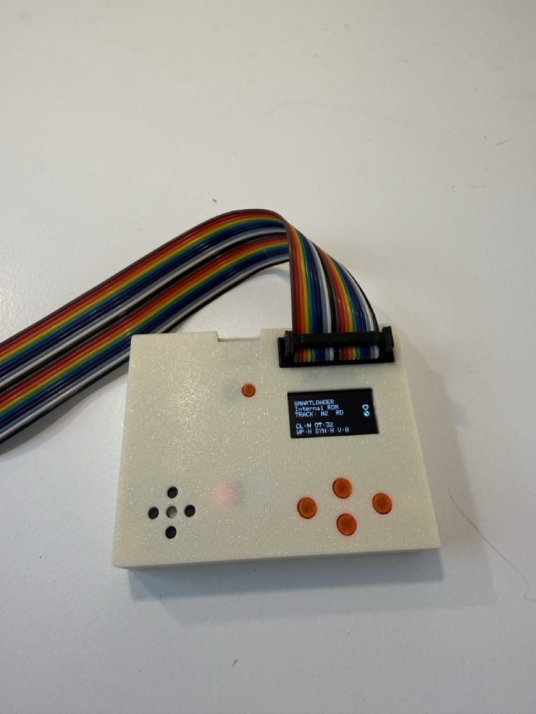 The SmartDisk II in its case, with the ribbon cable