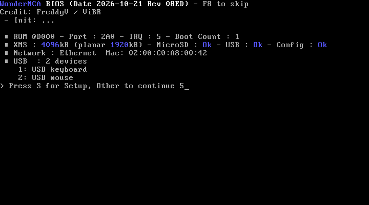 The boot banner of the card: the option ROM revision, the resources, the extended memory, the microSD card, the USB devices and the network, then "Press S for Setup, Other to continue"